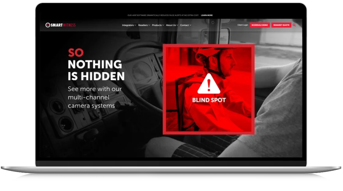 Smart Witness website shown on laptop